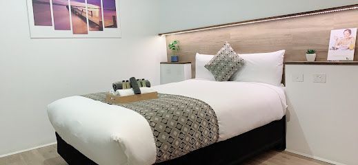 this is the picture of the Elm Motel one of the beds