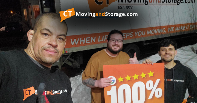 Three men posing with a 100% sign at a Moving and Storage company