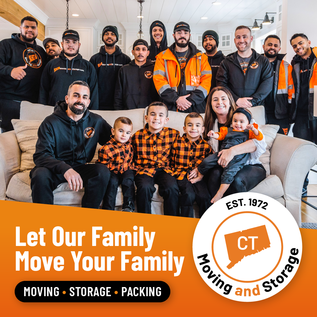 Group of people, including a family, posing with movers. Orange and black color scheme. Text promoting moving services.