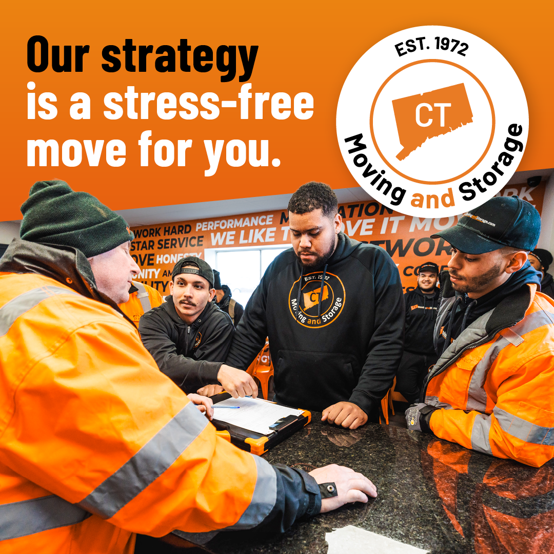 Movers in orange vests and hats, reviewing paperwork, with text