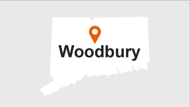 Map of Connecticut with a marker indicating the location of Woodbury.