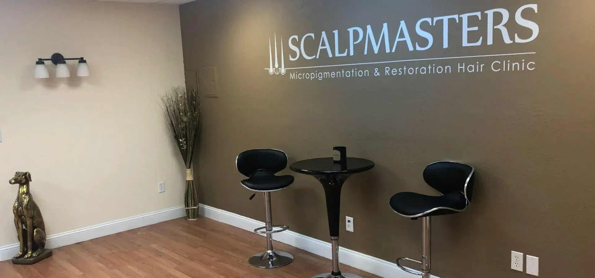 A room with a sign on the wall that says scalpmasters