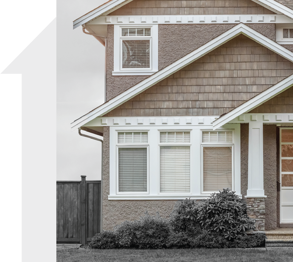 A house with a roof that has a lot of windows
