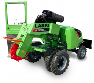 Ein grüner Laski F 500 Traktor mit offener Tür