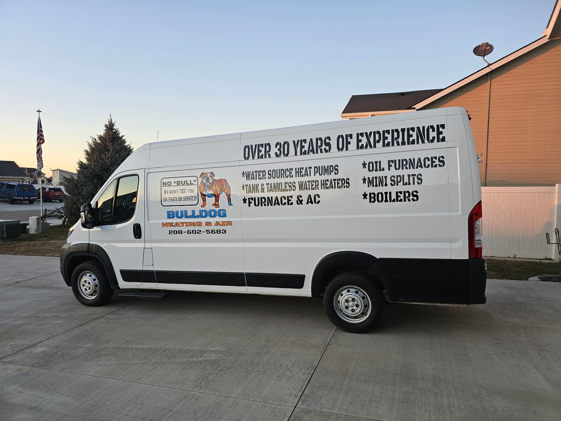 A wooden garage door with the logo for 208 Aloha Garage Door.