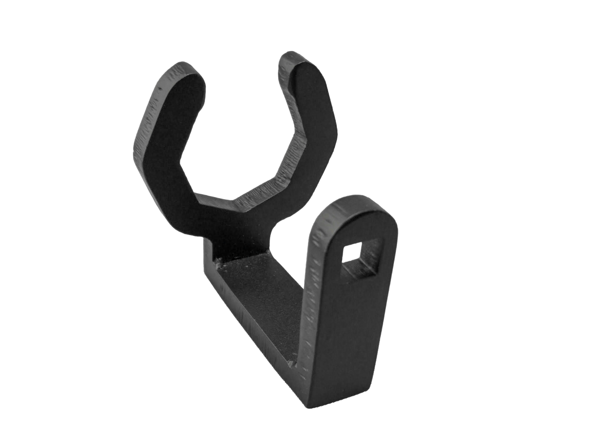 A close up of spa jet nut tool on a white background.