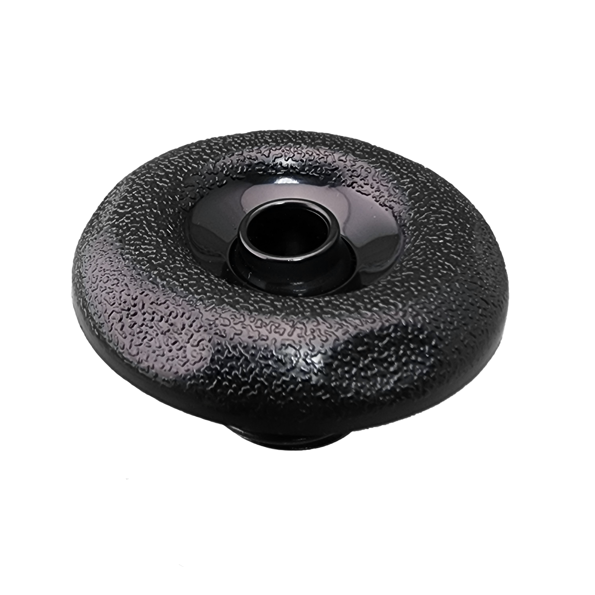 A black directional jet insert