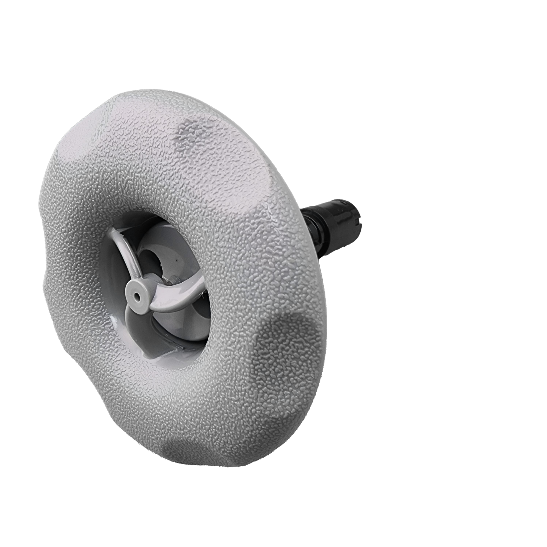 A close up of spa jet on a white background.