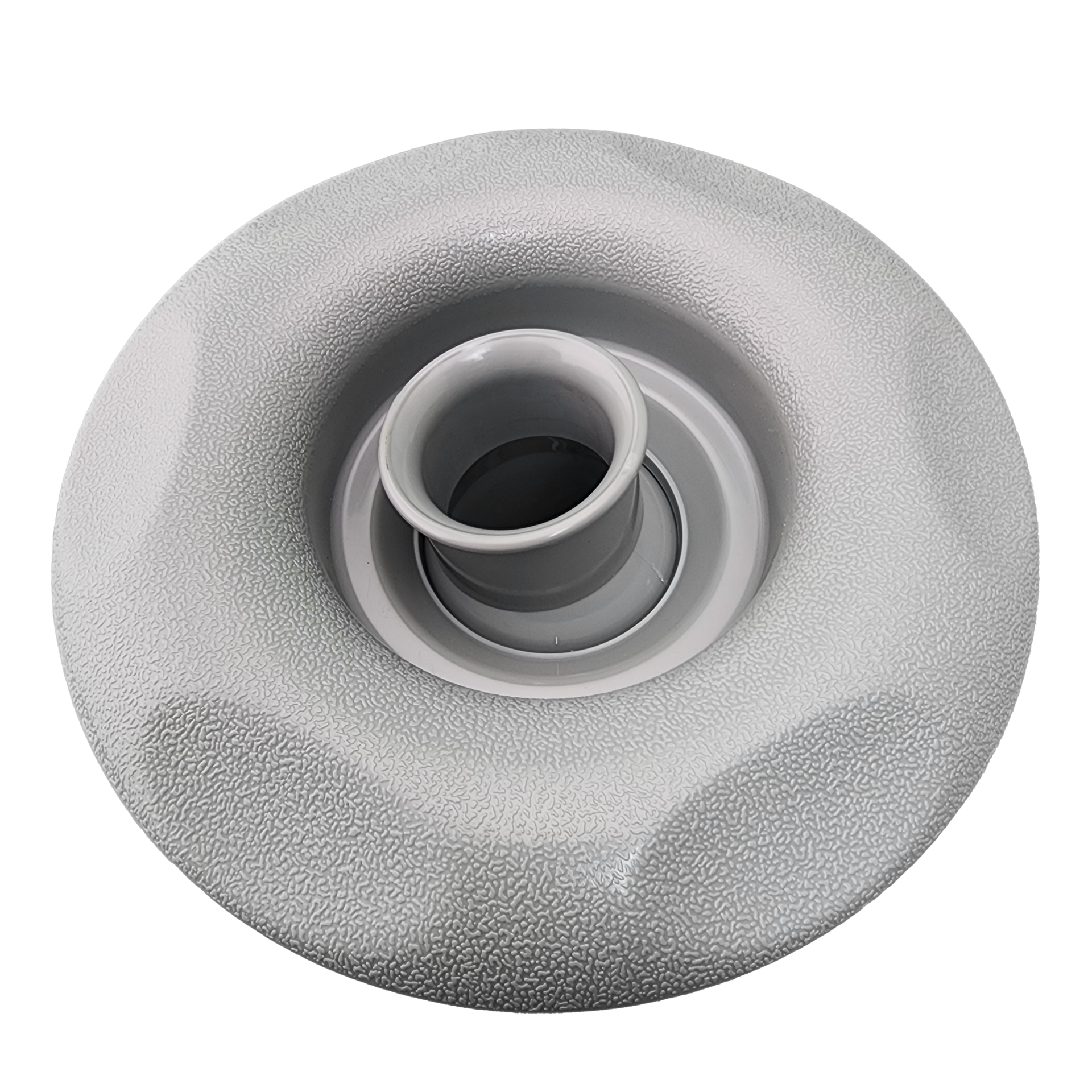 A close up of spa jet on a white background.