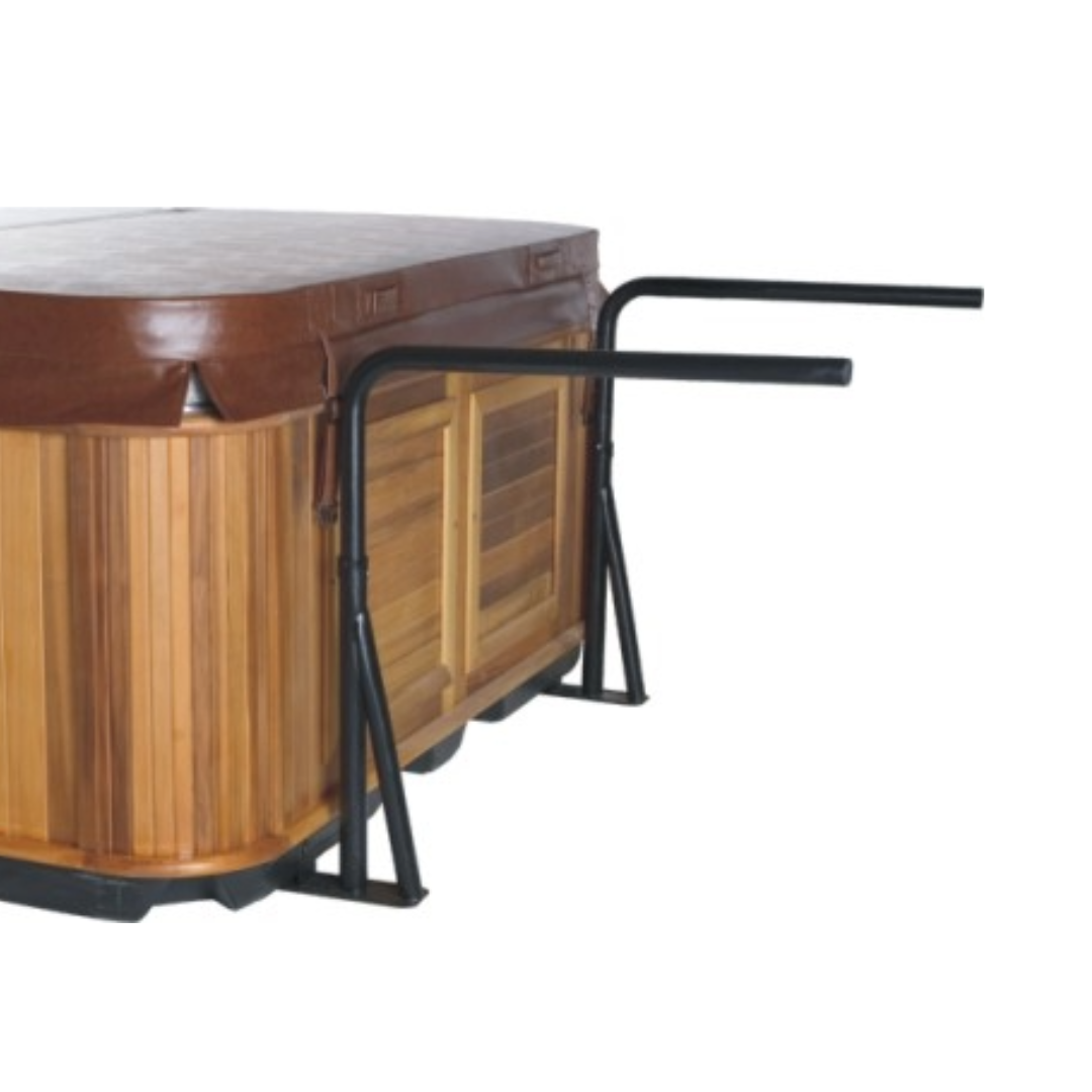 A wooden hot tub with a brown cover and black handles showing cabinet free cover shelf