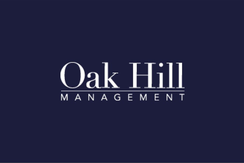 Oak Hill Management logo on a dark navy background, with white serif text.
