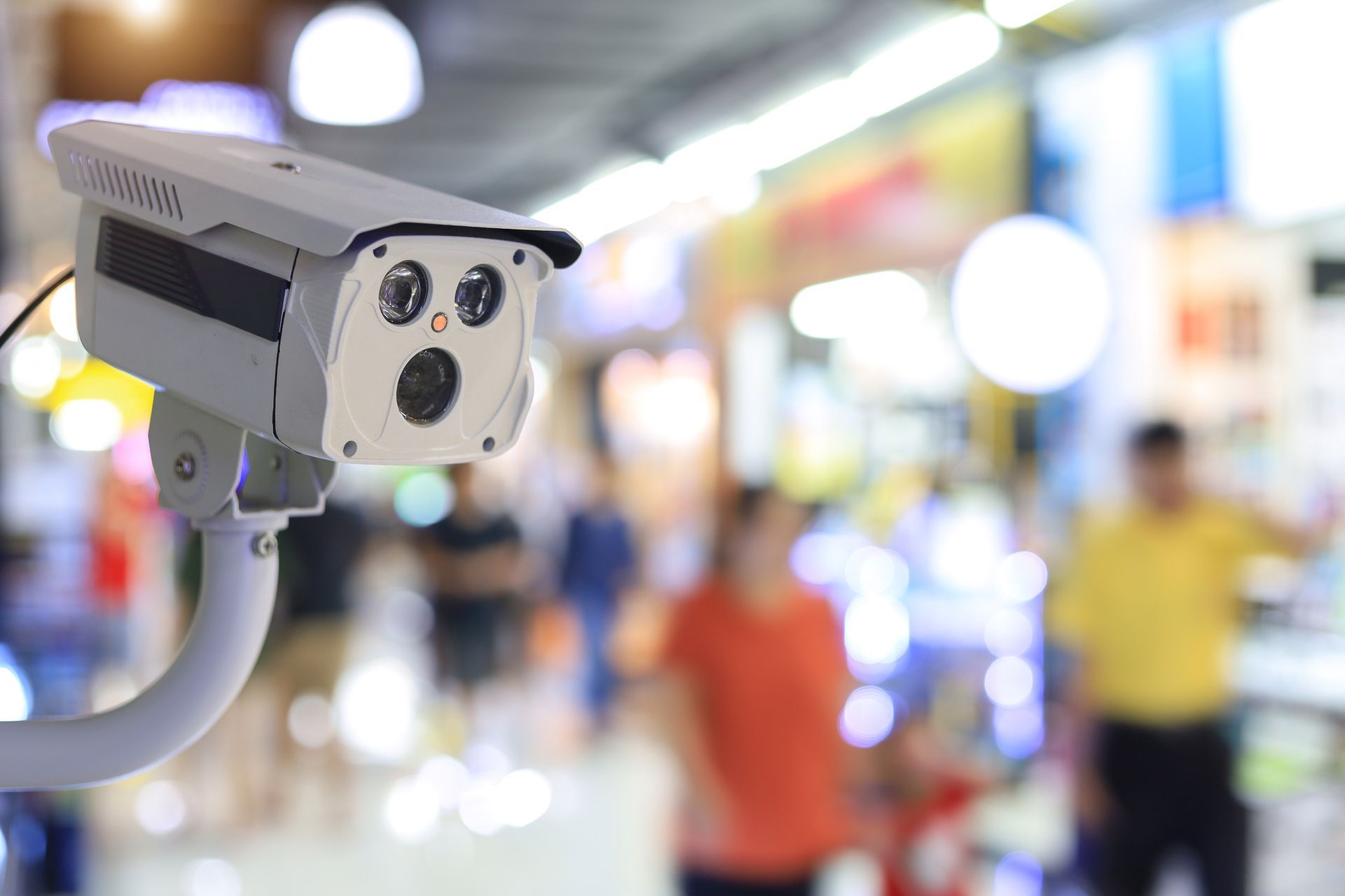 A close-up of a business security system CCTV camera installed by Phoenix Access Control on a store 