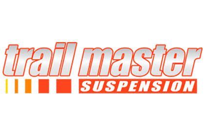 Trail Master Suspension logo in orange and gray with stylized text and colored bars