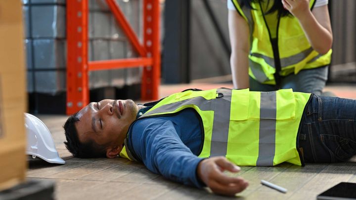 View of a construction worker who fell on the job site. View of a construction worker who fell on the job site.