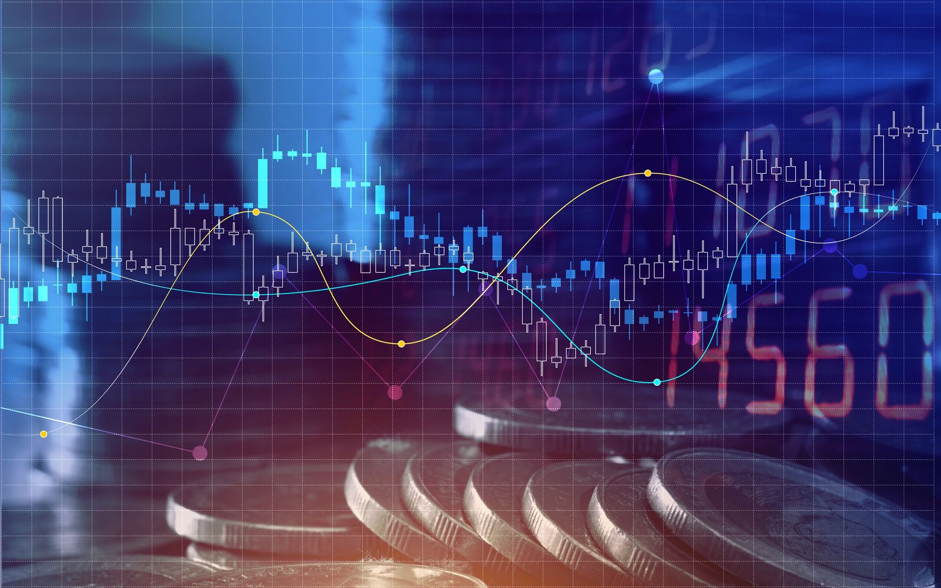 A stack of coins is sitting in front of a stock chart.