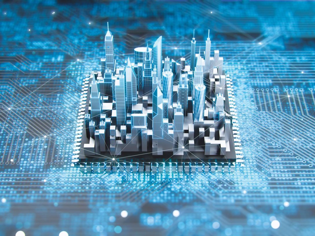A model of a city is sitting on top of a computer chip.