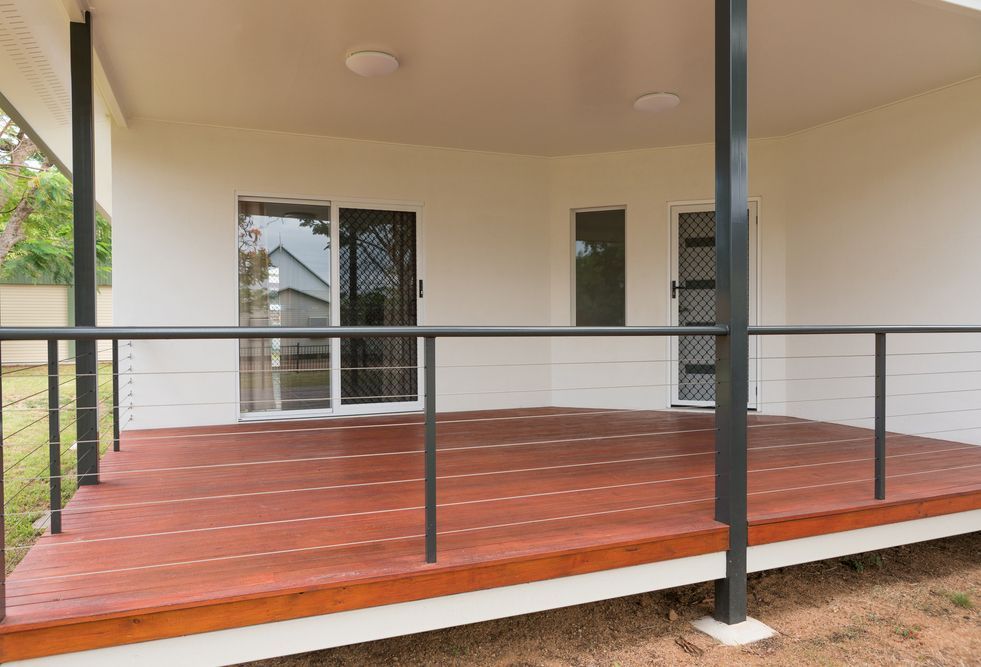 A Raised Wooden Deck Beside a House — All Aussie Sunrooms in Port Stephens, NSW