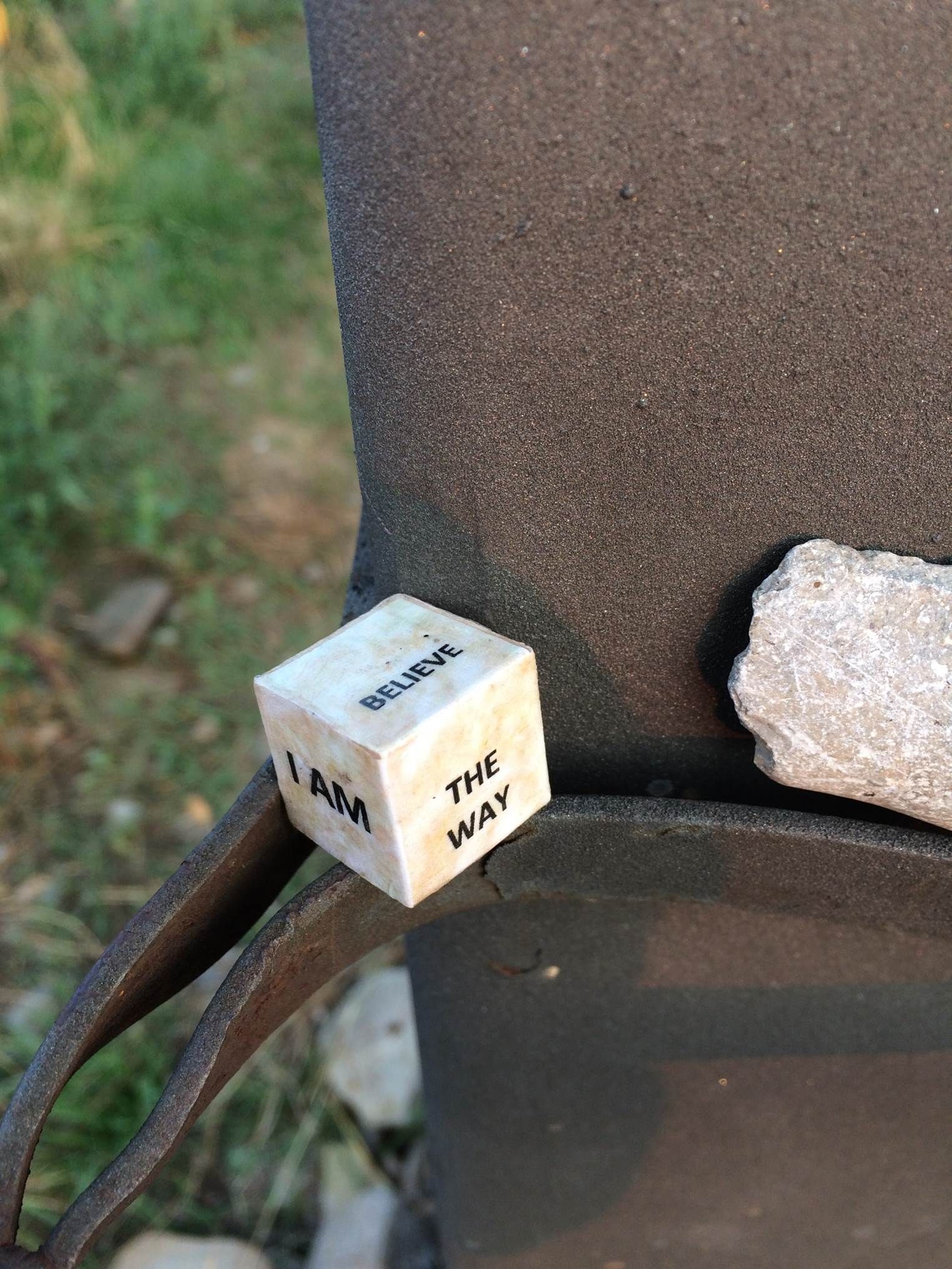 A picture of a dice saying 