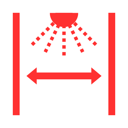 Symbole de gicleur rouge avec jet et flèche indiquant une mesure entre deux barres verticales.