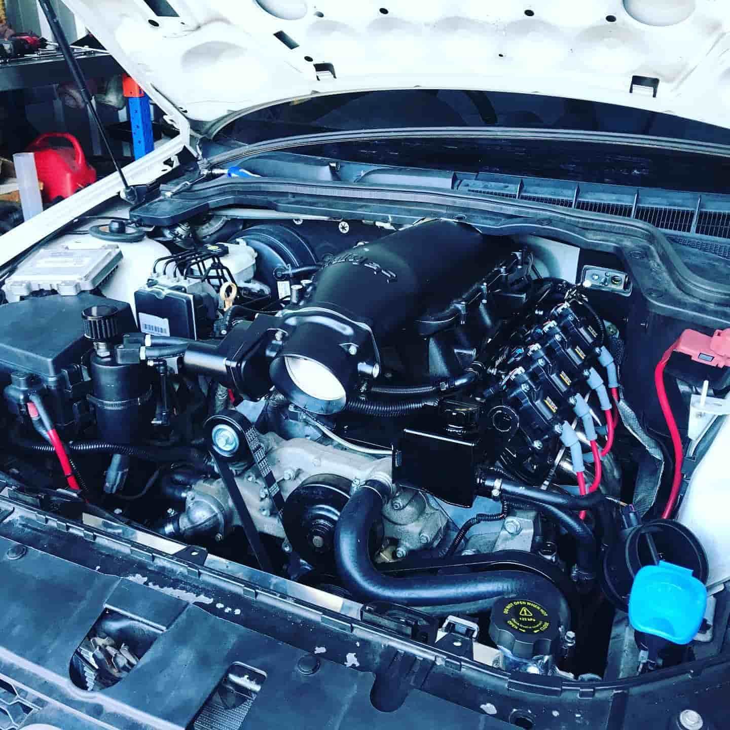 A Close Up Of A Car Engine With The Hood Open — ProStreet Automotive & Fabrication In Cardiff, NSW
