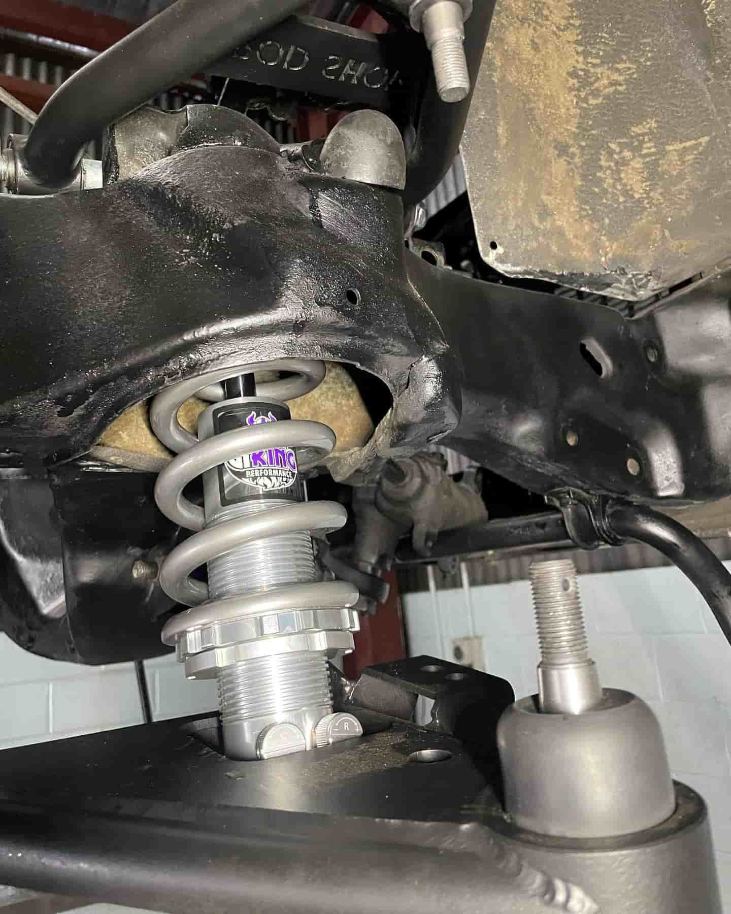 A Close Up Of A Shock Absorber On A Motorcycle — ProStreet Automotive & Fabrication In Cardiff, NSW
