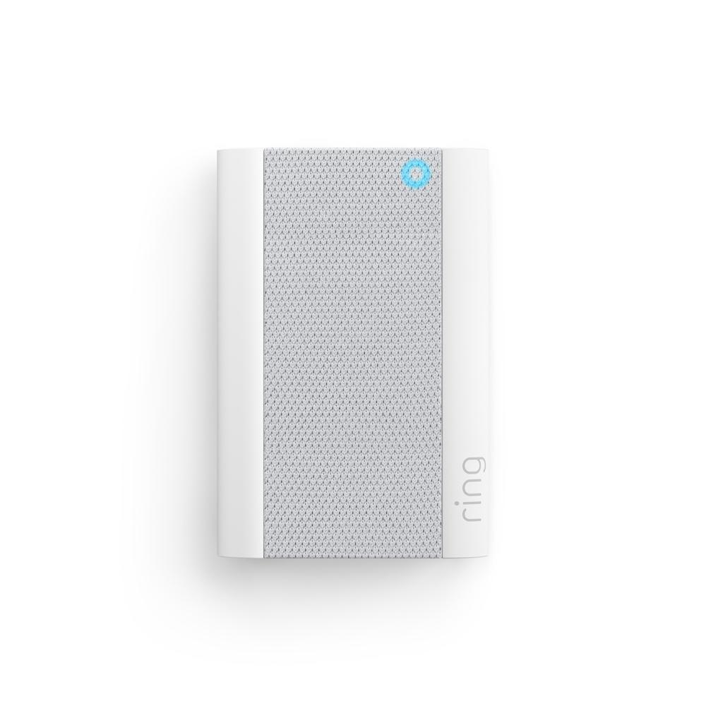 White Ring chime pro device on a white background with a blue light lit up.