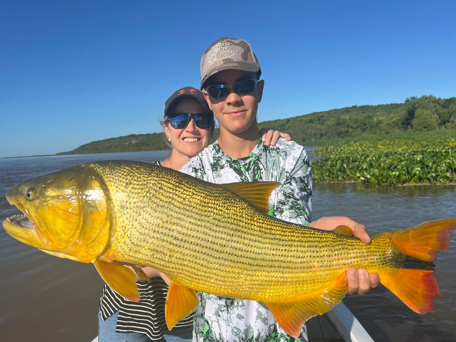 Anglers with trophy dorado at Rio Bermejo fishing destination