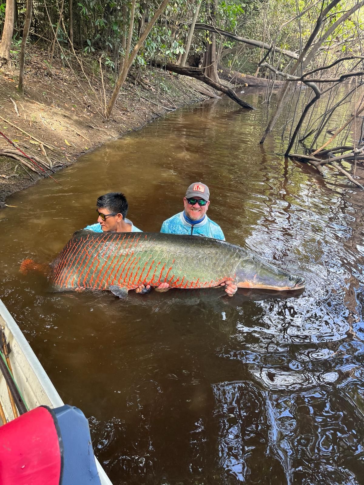 Jungle specialists navigating remote Amazon River waters