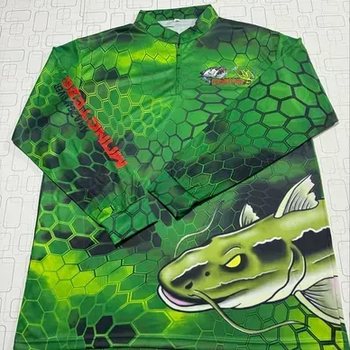 Green Amazon River Monsters fishing jersey apparel with fish scale pattern
