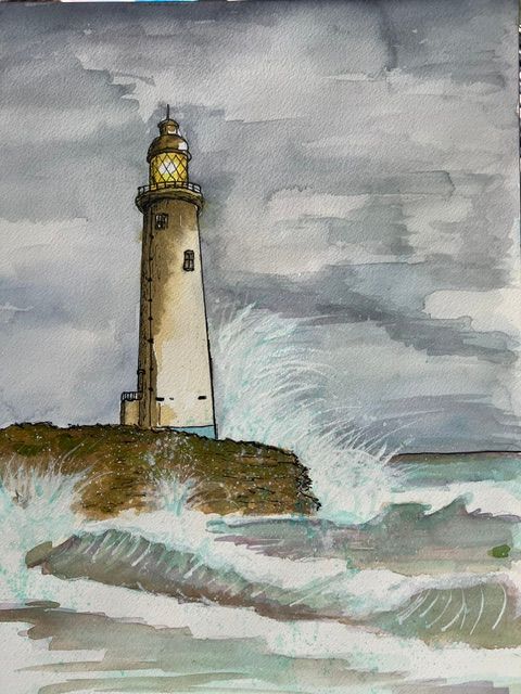 Lighthouse on a rocky coast under a gray cloudy sky, with waves crashing below.