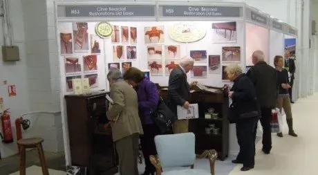 people around a clive beardall stall