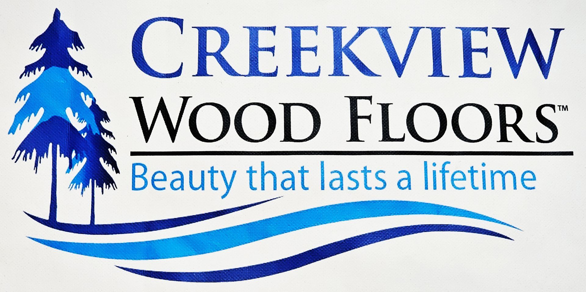 A logo for creekview wood floors beauty that lasts a lifetime