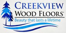 A logo for creekview wood floors beauty that lasts a lifetime