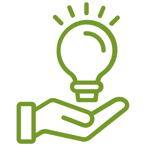A hand is holding a light bulb in its palm.