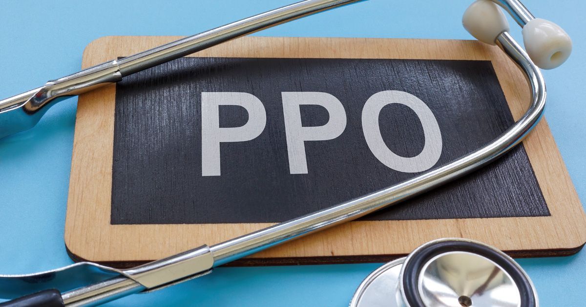 Stethoscope over a blackboard labeled PPO on a blue background
