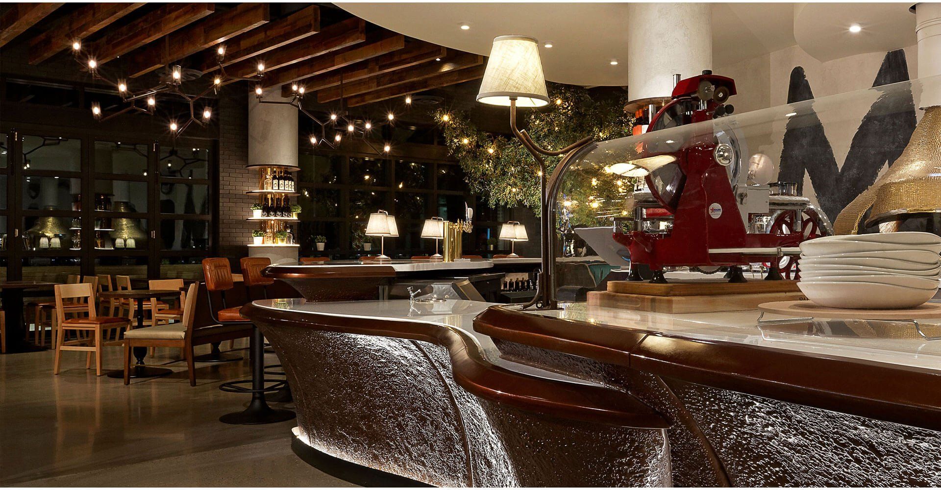 A restaurant with the letter m on the wall