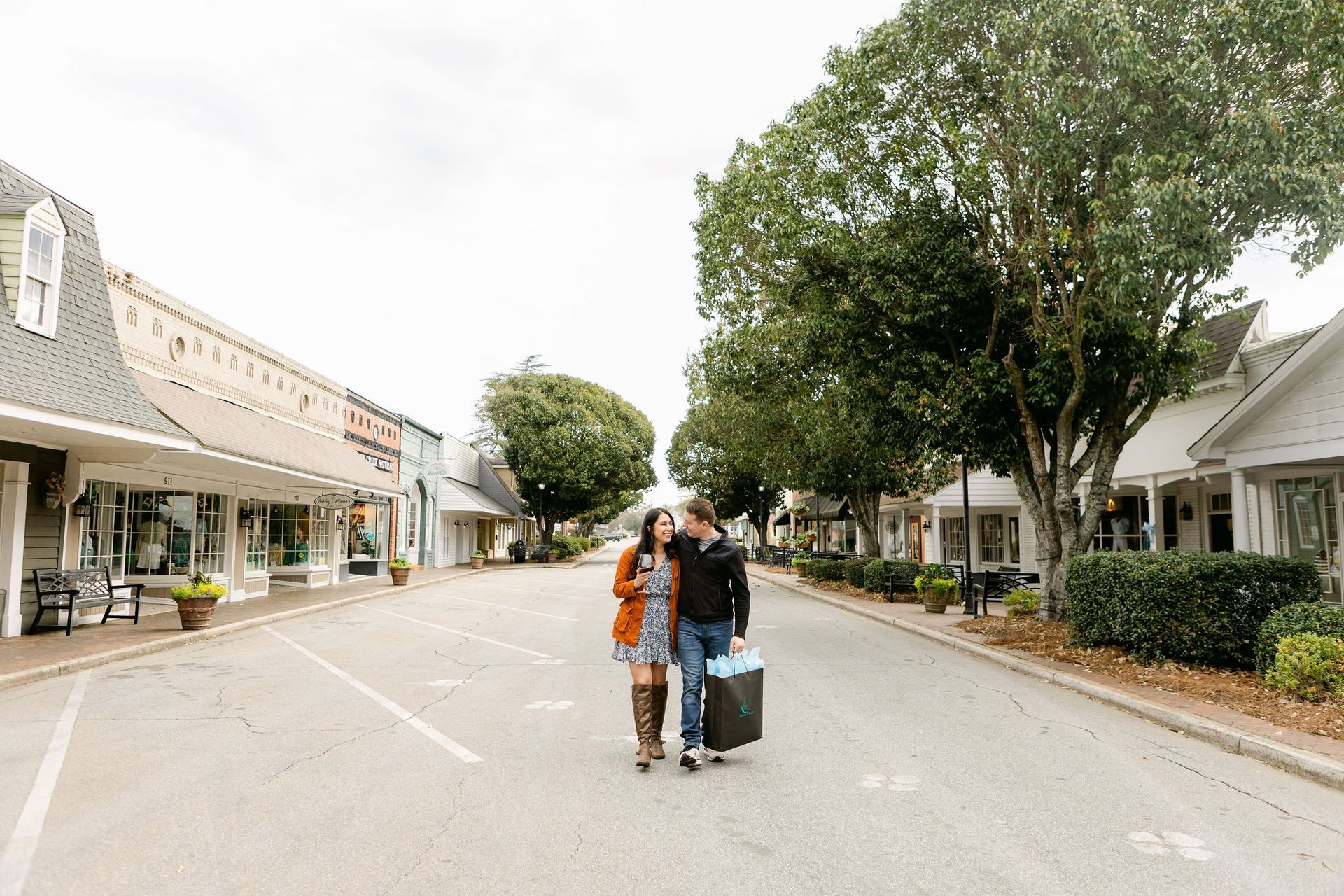 Couple strolling in historic Downtown Perry.