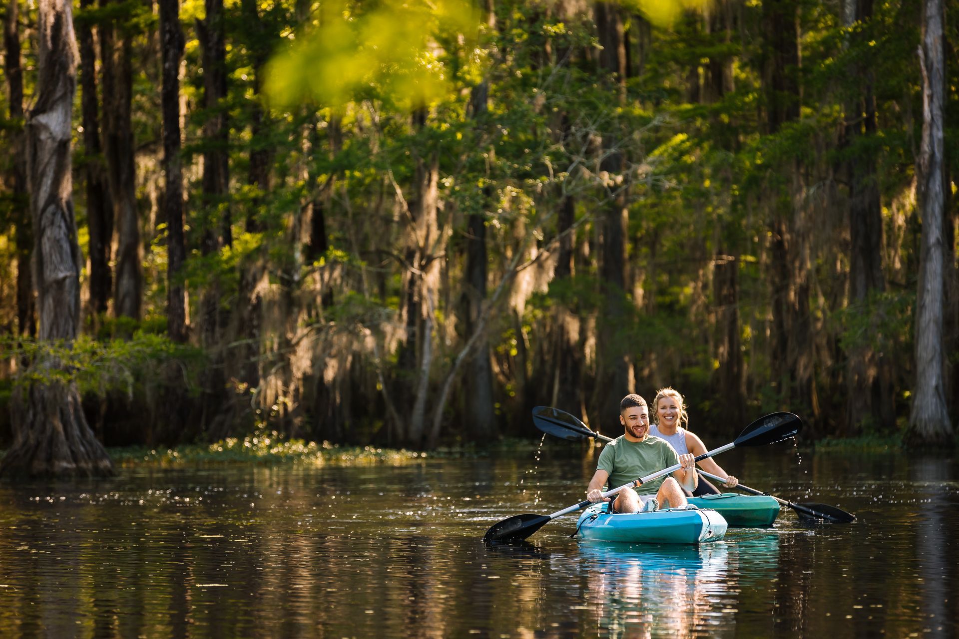 Kayakers on the water in Blackwater Preserve in Statesboro, Georgia.
