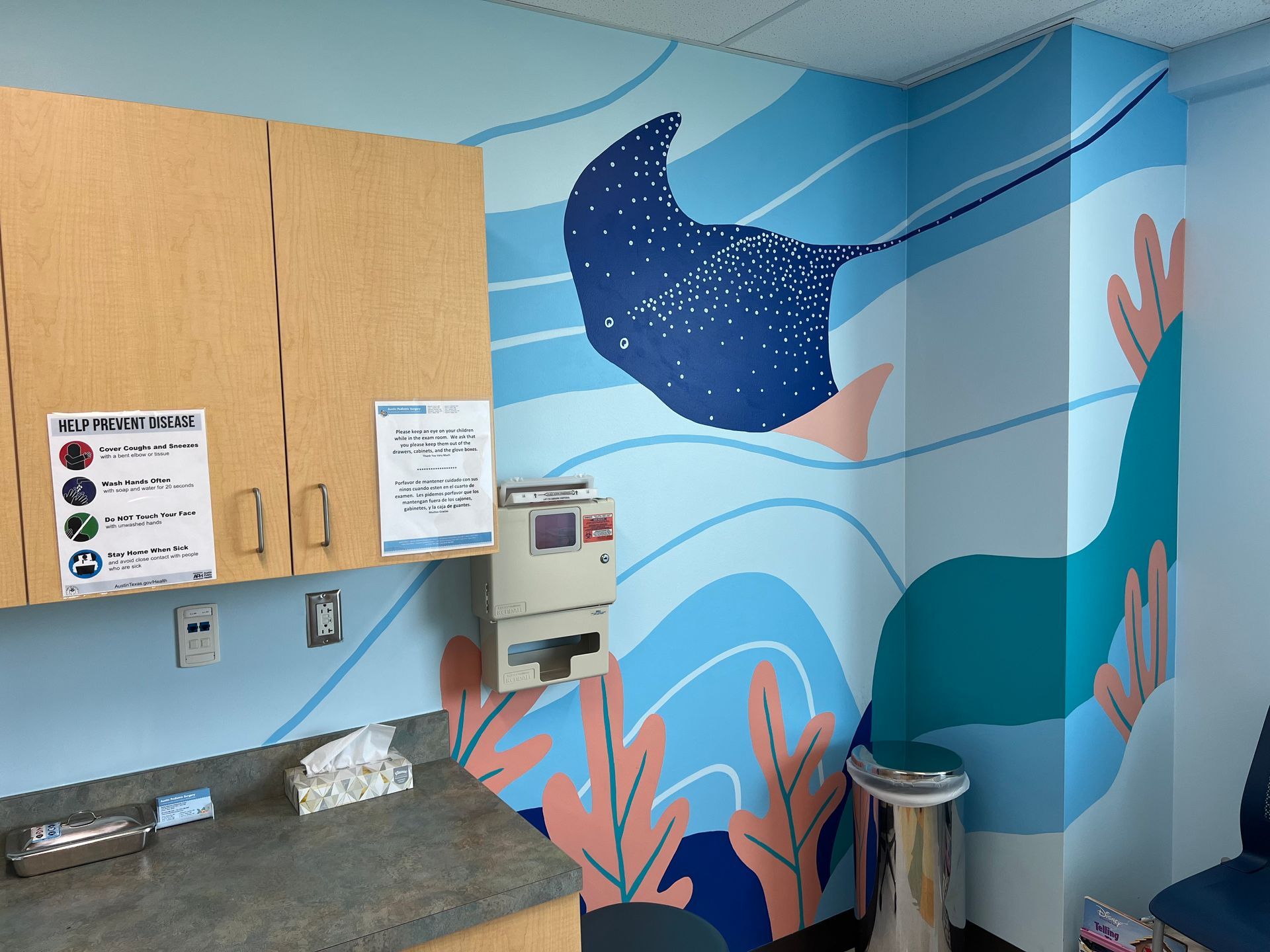 Spotted eagle ray mural in a pediatric exam room, Austin TX