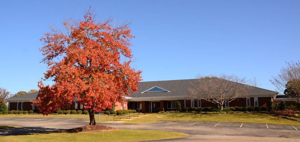 Jefferson Memorial Funeral Home Outside View with Tree