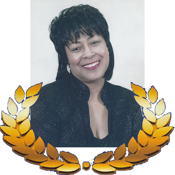 Woman smiling, wearing black, framed by golden laurel wreath.