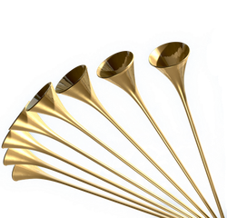 Five gold gramophones fanned out on a white background