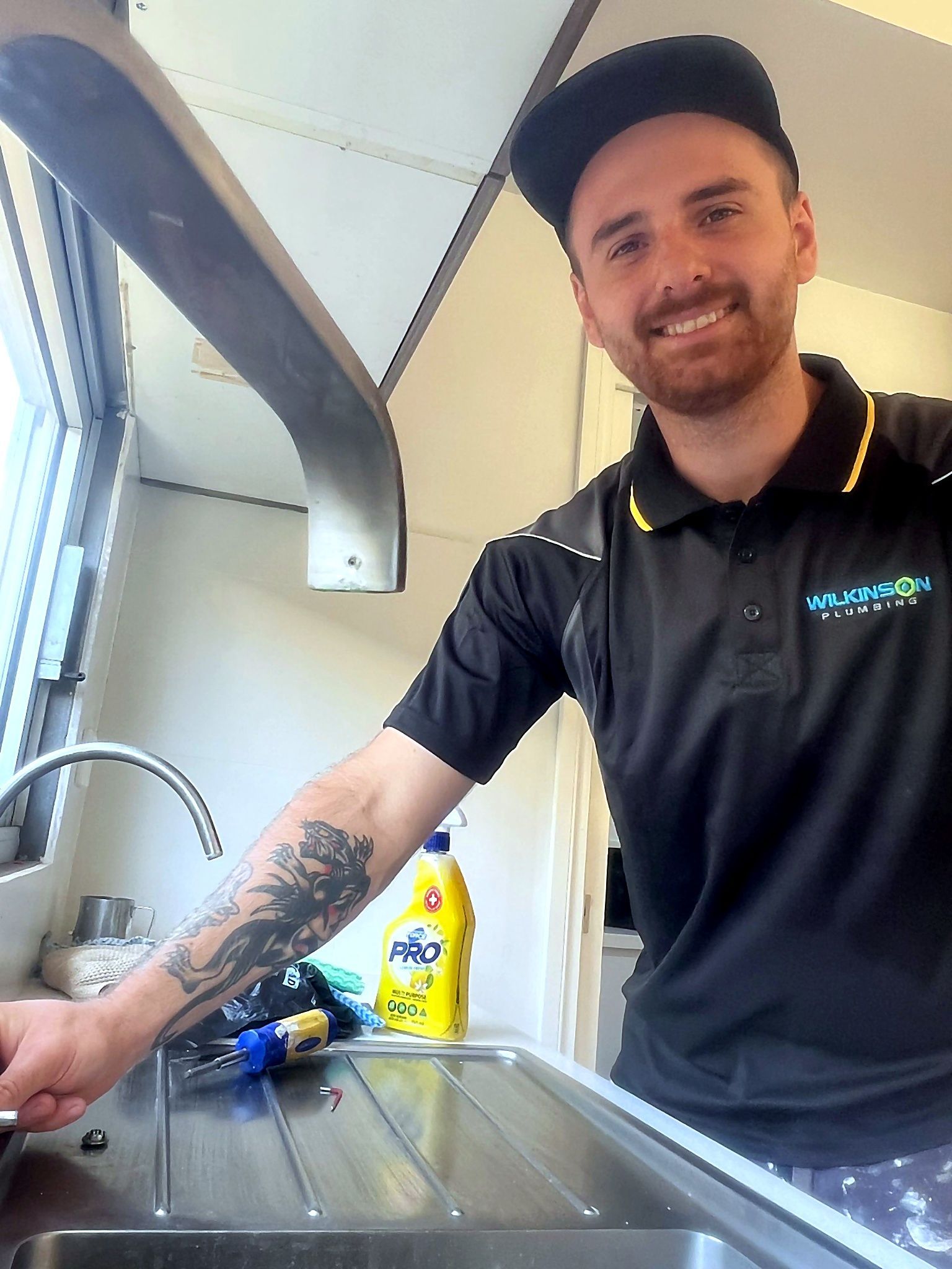 Wilkinson plumber smiling for the camera