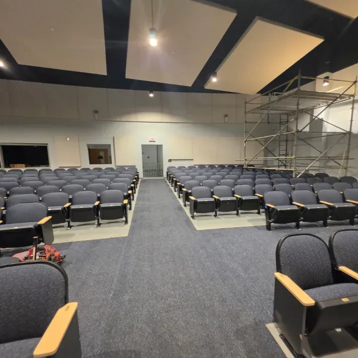 Auditorium with scaffolding along the right wall for new lighting changeout