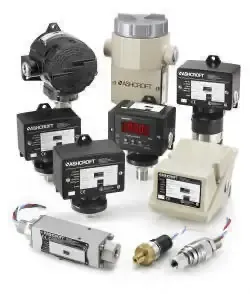 Assorted industrial sensors and control devices in black, white, and metallic housings on a white background