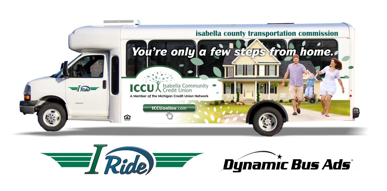 picture of a bus with advertisements.