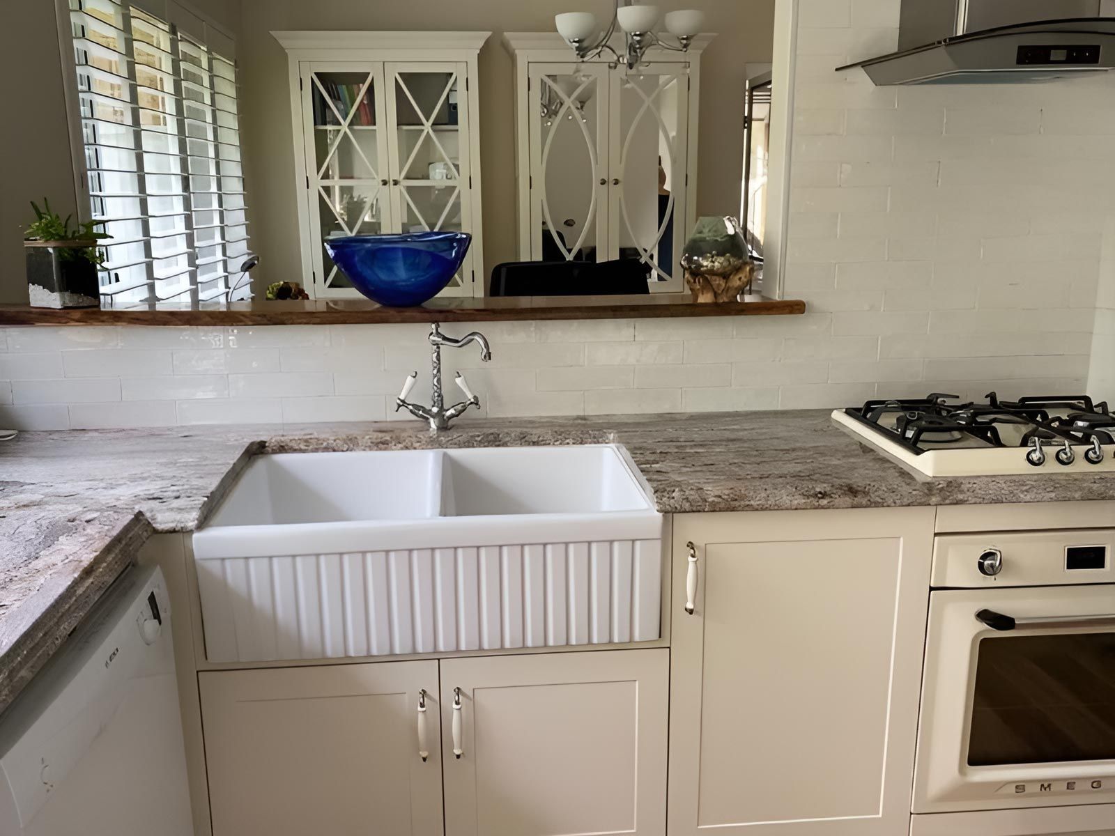 Modern Kitchen With a Marbled Countertop — Piscopo Kitchens Plus In Forster, NSW