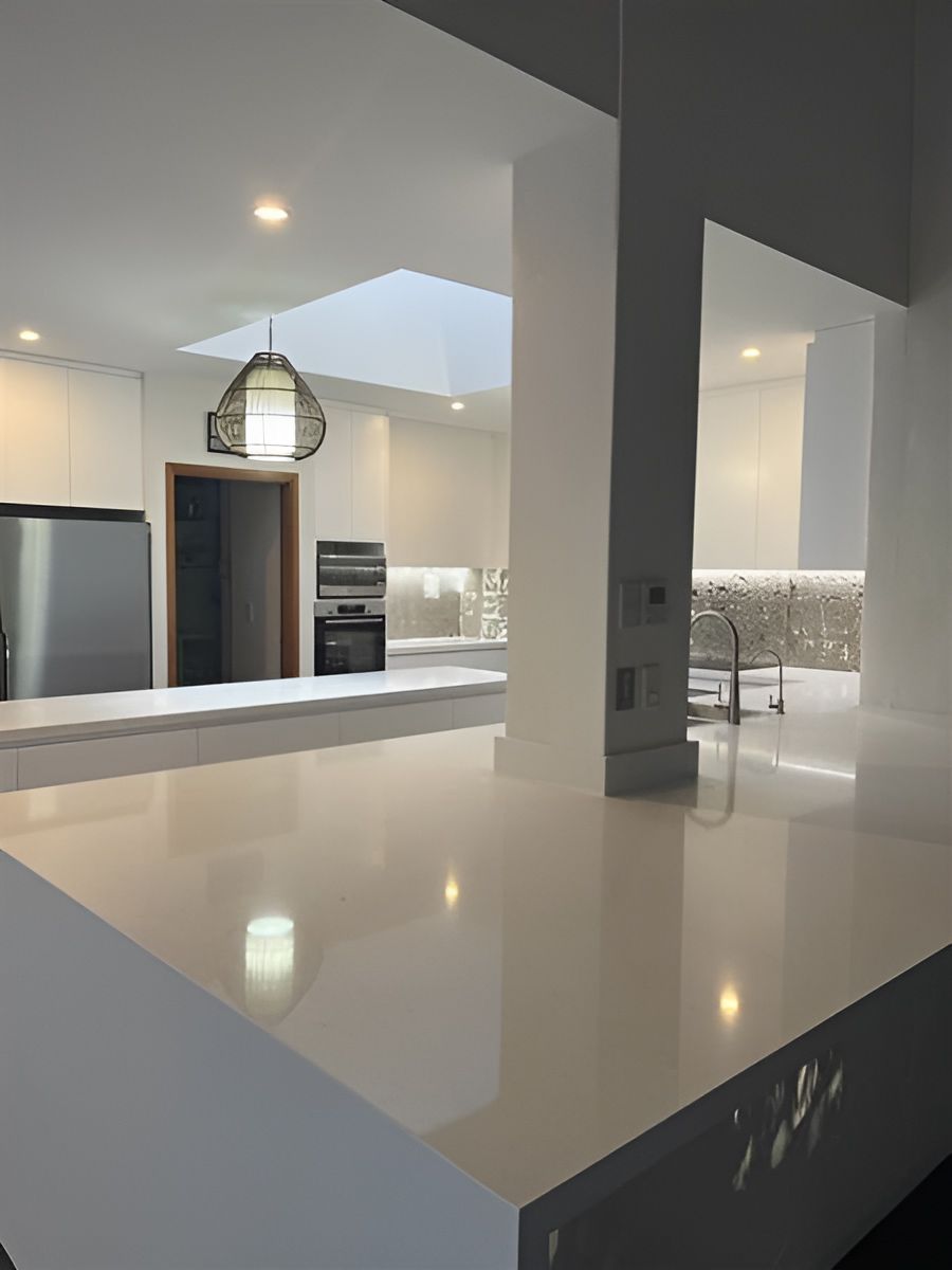 Modern Kitchen With Glossy White Countertops — Piscopo Kitchens Plus In Forster, NSW