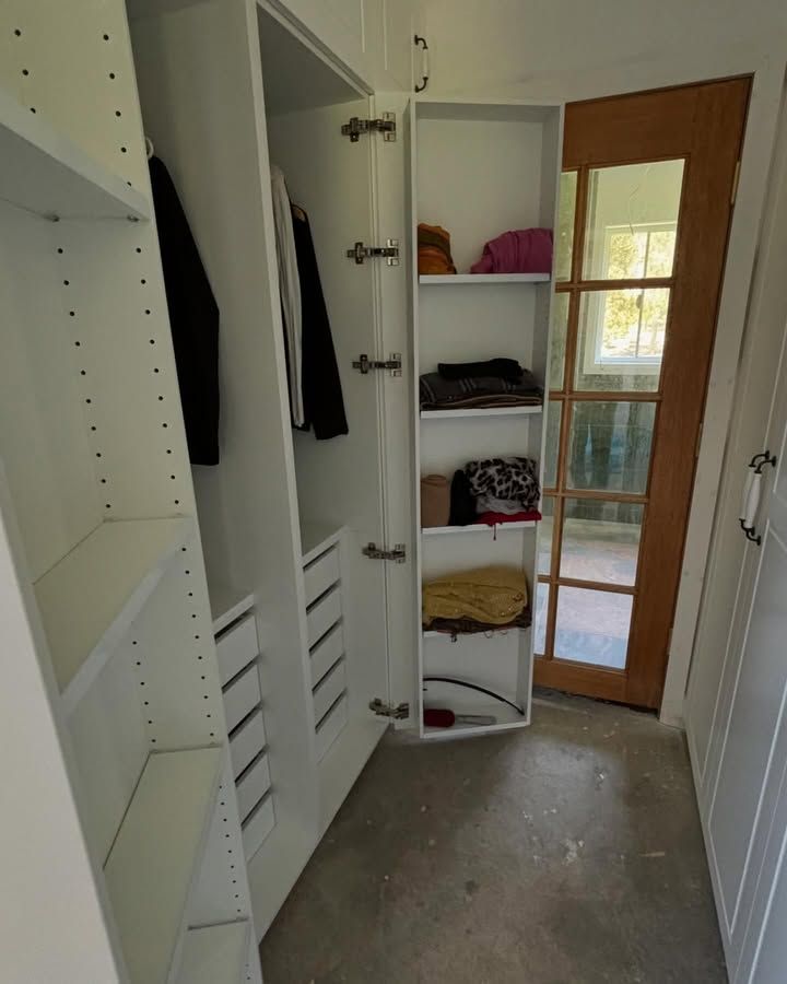 White Walk-in Closet With Open Drawers, Shelves of Folded Clothes— Piscopo Kitchens Plus In Forster, NSW