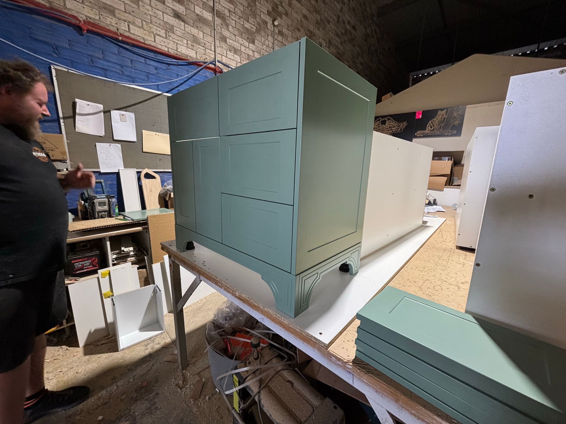 Green Metal Cabinet on a Workbench in a Workshop — Piscopo Kitchens Plus In Forster, NSW